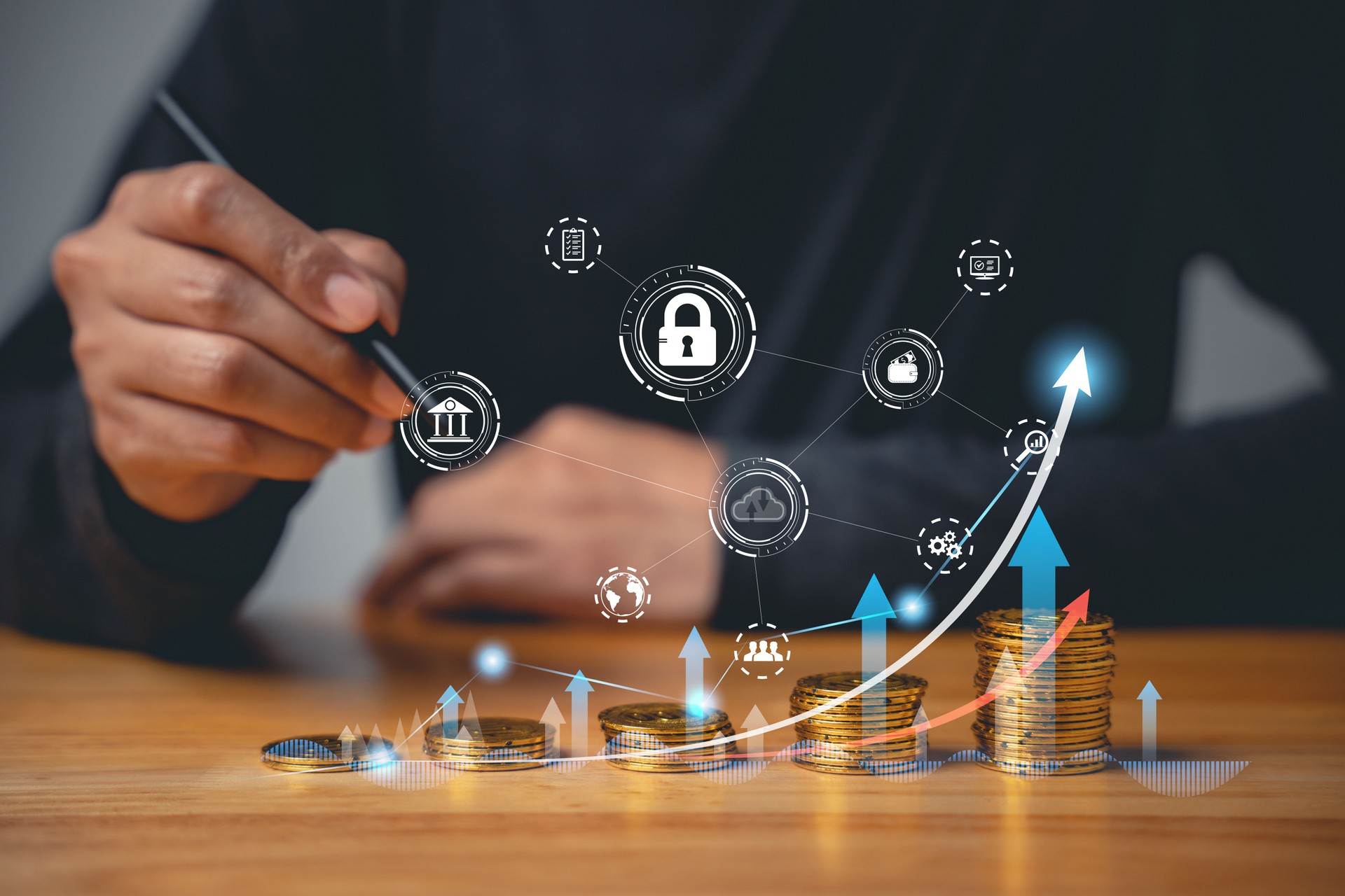 Hand of businessman holding coin on stack of coins with rising graph